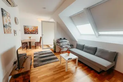 Ein Sitzbereich in der Unterkunft Danube Rooftop Apartment 15