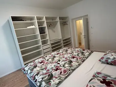Ein Bett oder Betten in einem Zimmer der Unterkunft Favoriten Apartments