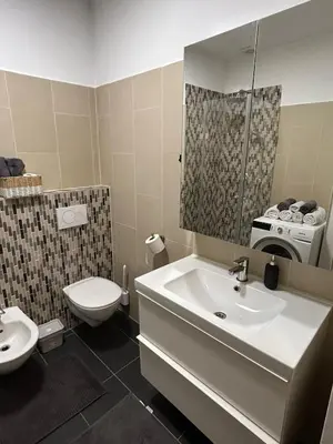 Ein Badezimmer in der Unterkunft Favoriten Apartments