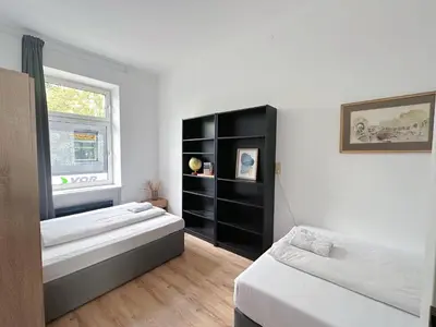Ein Bett oder Betten in einem Zimmer der Unterkunft Up Residences