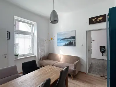 Ein Sitzbereich in der Unterkunft Up Residences