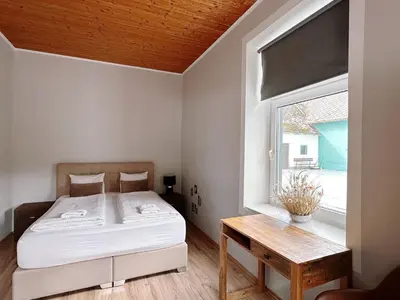 Ein Bett oder Betten in einem Zimmer der Unterkunft Up Residences