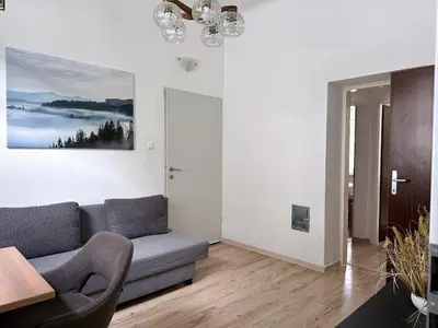 Ein Sitzbereich in der Unterkunft Up Residences
