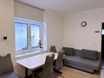 Ein Sitzbereich in der Unterkunft Up Residences