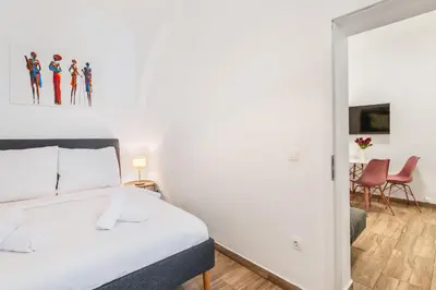 Ein Bett oder Betten in einem Zimmer der Unterkunft Cozy I central I free parking