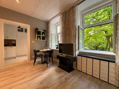 TV/Unterhaltungsangebot in der Unterkunft Urban-Elegance Silent-Garden