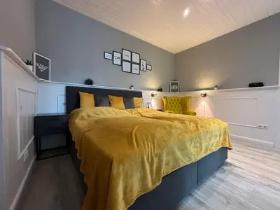 Ein Bett oder Betten in einem Zimmer der Unterkunft Urban-Elegance Silent-Garden