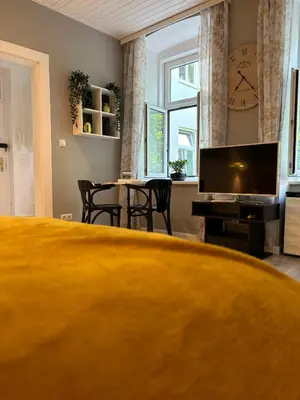 TV/Unterhaltungsangebot in der Unterkunft Urban-Elegance Silent-Garden