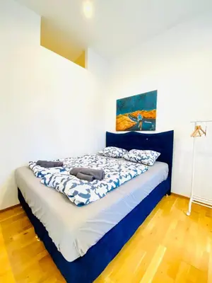 Ein Bett oder Betten in einem Zimmer der Unterkunft Cozy Rooms in Brigittenau Area MM23