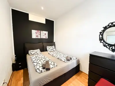 Ein Bett oder Betten in einem Zimmer der Unterkunft Cozy Rooms in Brigittenau Area MM29