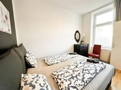 Ein Bett oder Betten in einem Zimmer der Unterkunft Cozy Rooms in Brigittenau Area MM29