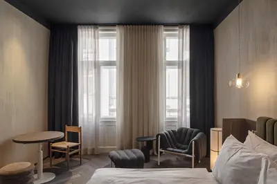 Ein Bett oder Betten in einem Zimmer der Unterkunft Rooms by Wolfensson - Boutique Hotel