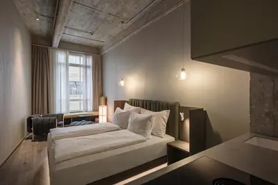 Ein Bett oder Betten in einem Zimmer der Unterkunft Rooms by Wolfensson - Boutique Hotel