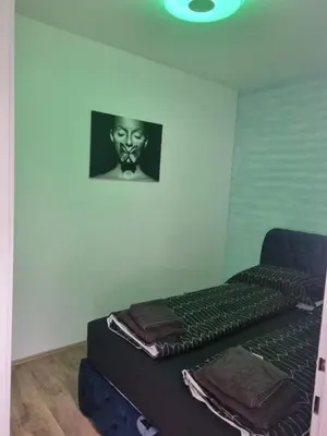 Ein Bett oder Betten in einem Zimmer der Unterkunft Royal Apartments