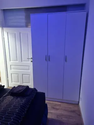 Ein Bett oder Betten in einem Zimmer der Unterkunft Royal Apartments
