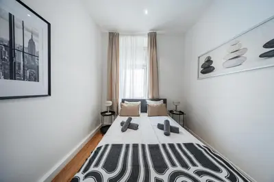 Ein Bett oder Betten in einem Zimmer der Unterkunft Nice Central City Room