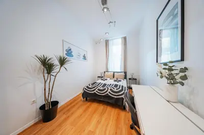 Ein Bett oder Betten in einem Zimmer der Unterkunft Nice Central City Room