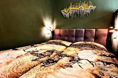 Ein Bett oder Betten in einem Zimmer der Unterkunft Modern flat with great location for longer stays
