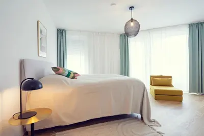 Ein Bett oder Betten in einem Zimmer der Unterkunft MEVERLING Lemon 4