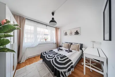 Ein Bett oder Betten in einem Zimmer der Unterkunft Central City Lofts