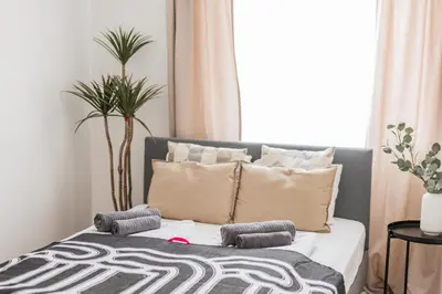 Ein Bett oder Betten in einem Zimmer der Unterkunft Central City Lofts
