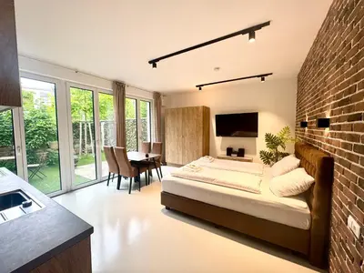 Ein Bett oder Betten in einem Zimmer der Unterkunft Möbliertes Apartment mit Terrasse