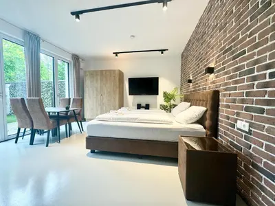 Ein Bett oder Betten in einem Zimmer der Unterkunft Möbliertes Apartment mit Terrasse