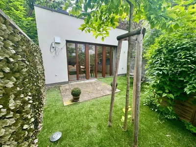 Ein Garten an der Unterkunft Möbliertes Apartment mit Terrasse