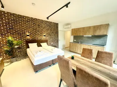 Ein Bett oder Betten in einem Zimmer der Unterkunft Möbliertes Apartment mit Terrasse