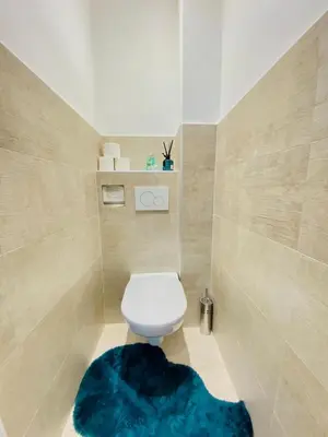 Ein Badezimmer in der Unterkunft Elegant 2BR Apartment with Balcony Near Millennium City