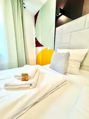 Ein Bett oder Betten in einem Zimmer der Unterkunft Wohnung mit Balkon