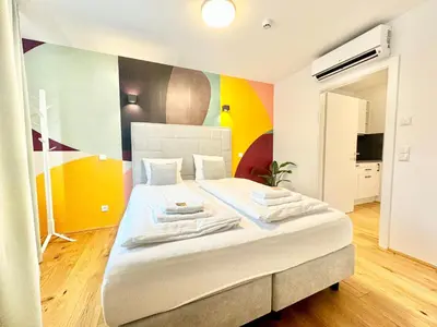 Ein Bett oder Betten in einem Zimmer der Unterkunft Wohnung mit Balkon