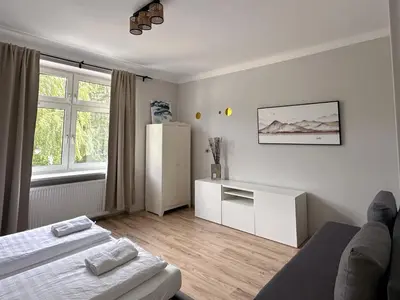 Ein Bett oder Betten in einem Zimmer der Unterkunft Up Resistances G