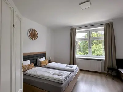 Ein Bett oder Betten in einem Zimmer der Unterkunft Up Resistances G
