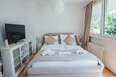 Ein Bett oder Betten in einem Zimmer der Unterkunft Bezauberndes Studio mit privatem Garten