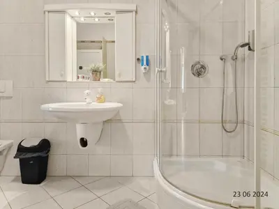 Ein Badezimmer in der Unterkunft Four-Bedroom, Four King-Size Comfort