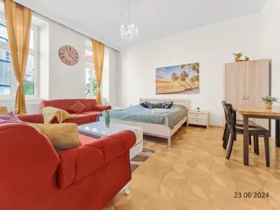 Ein Sitzbereich in der Unterkunft Four-Bedroom, Four King-Size Comfort