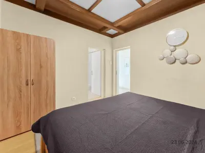Ein Bett oder Betten in einem Zimmer der Unterkunft Four-Bedroom, Four King-Size Comfort