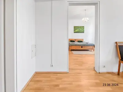 Ein Bett oder Betten in einem Zimmer der Unterkunft Elegant Three-Bedroom Suite
