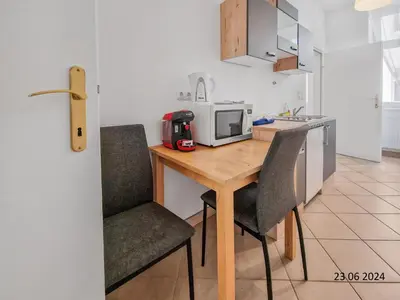 Küche/Küchenzeile in der Unterkunft Elegant Three-Bedroom Suite