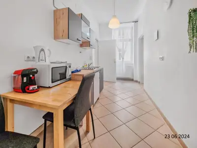 Küche/Küchenzeile in der Unterkunft Elegant Three-Bedroom Suite