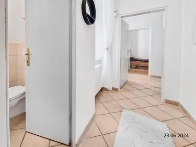 Ein Badezimmer in der Unterkunft Elegant Three-Bedroom Suite
