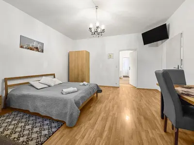 Ein Bett oder Betten in einem Zimmer der Unterkunft Modern Three-Bedroom, Triple King Beds