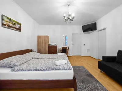 Ein Bett oder Betten in einem Zimmer der Unterkunft Spacious Three-Bedroom, Three King-Size Beds