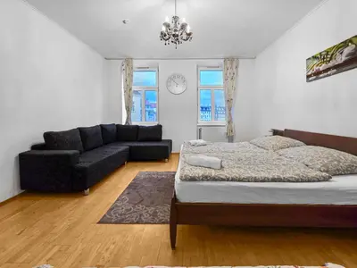 Ein Sitzbereich in der Unterkunft Spacious Three-Bedroom, Three King-Size Beds