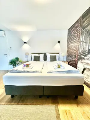 Ein Bett oder Betten in einem Zimmer der Unterkunft Wohnung mit Balkon und Parkplatz