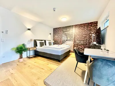 Ein Bett oder Betten in einem Zimmer der Unterkunft Wohnung mit Balkon und Parkplatz