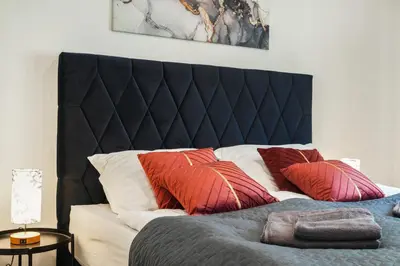 Ein Bett oder Betten in einem Zimmer der Unterkunft Stephansdom Residence Apartment