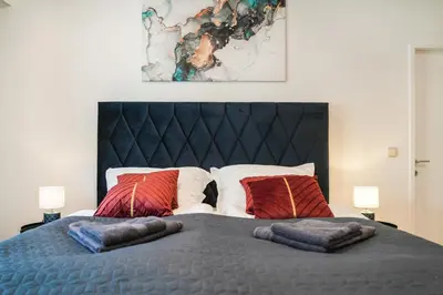 Ein Bett oder Betten in einem Zimmer der Unterkunft Stephansdom Residence Apartment