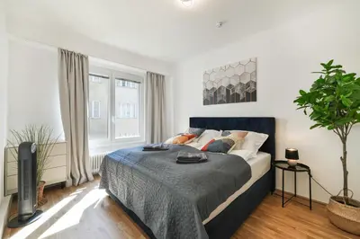 Ein Bett oder Betten in einem Zimmer der Unterkunft Stephansdom View Big Apartment I Self-Checkin